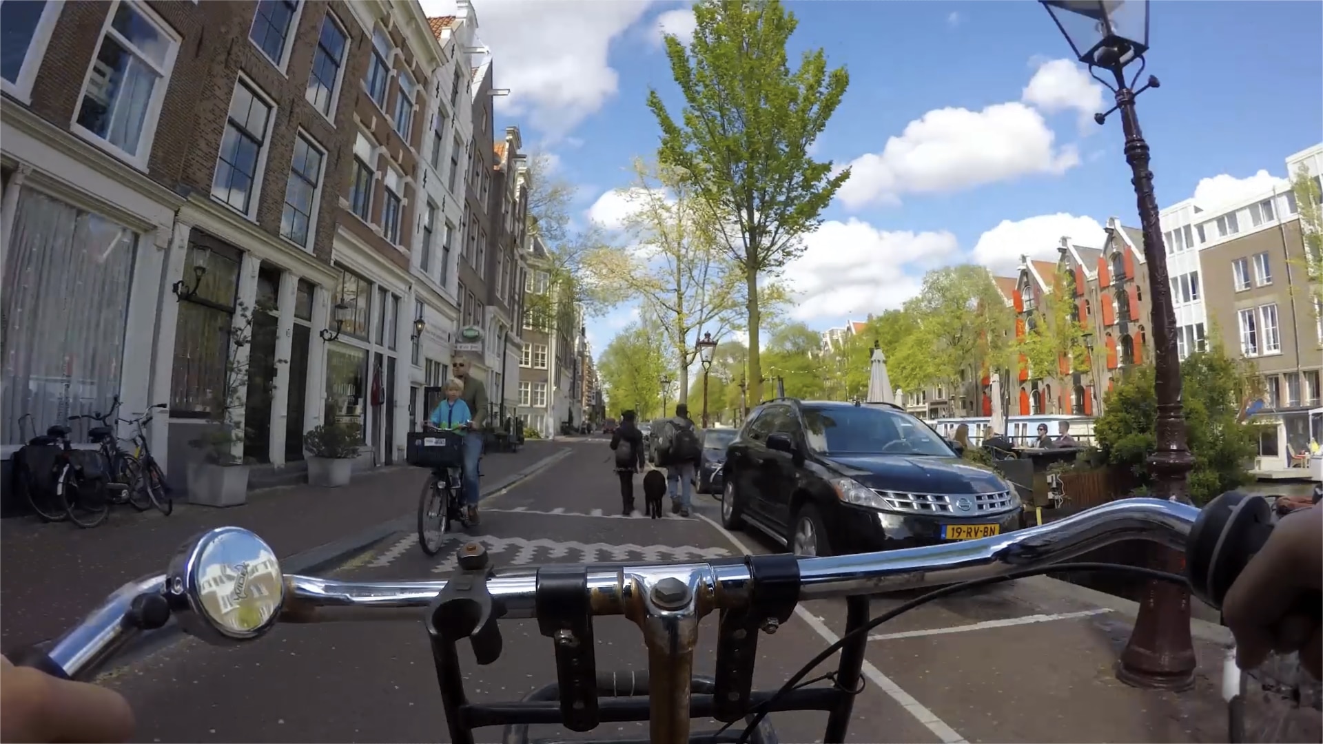 riding a bike through Amsterdam